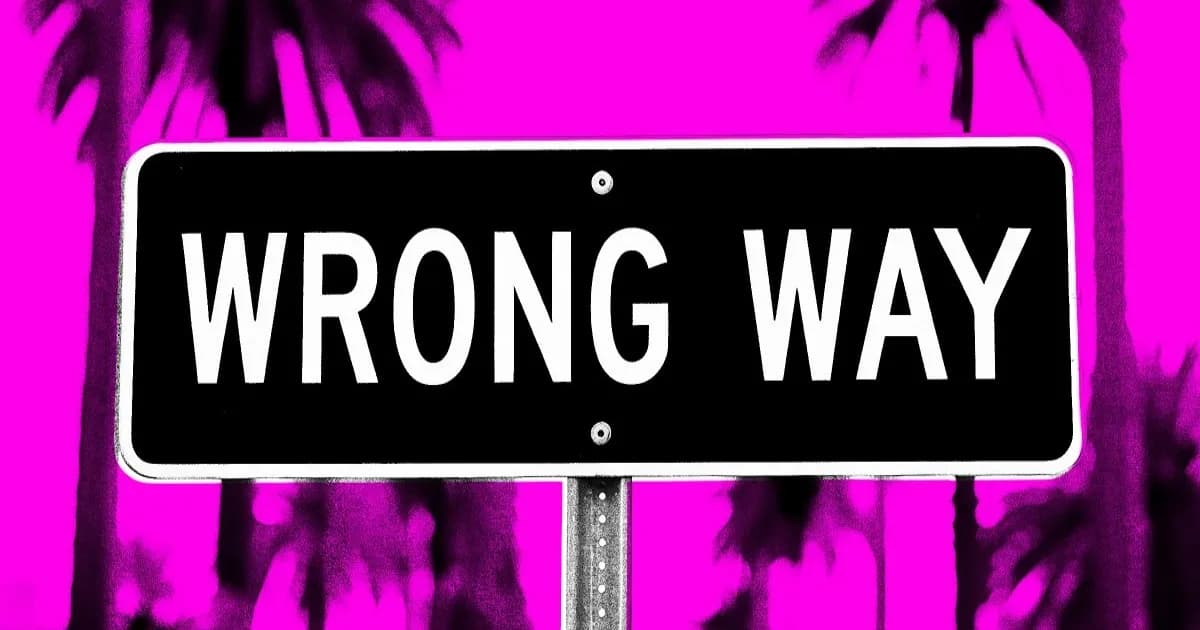 Ilustrasi rambu 'wrong way' di Los Angeles dengan latar gedung pencakar langit dan lalu lintas padat