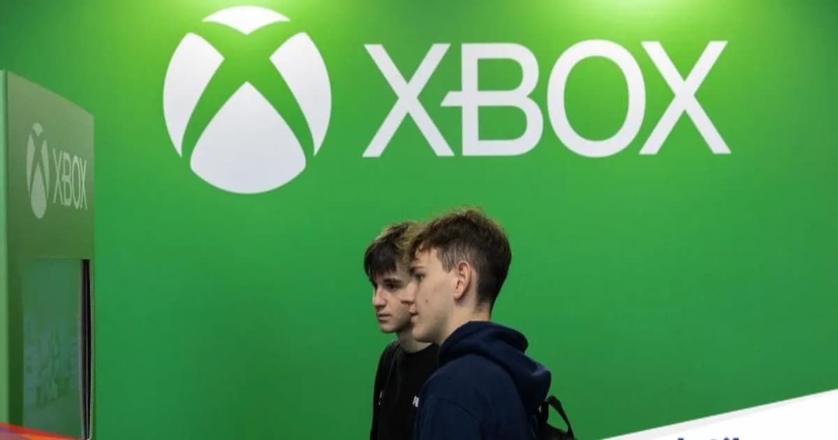 Ilustrasi logo Xbox dengan latar gelap menggambarkan penurunan pendapatan divisi game Microsoft