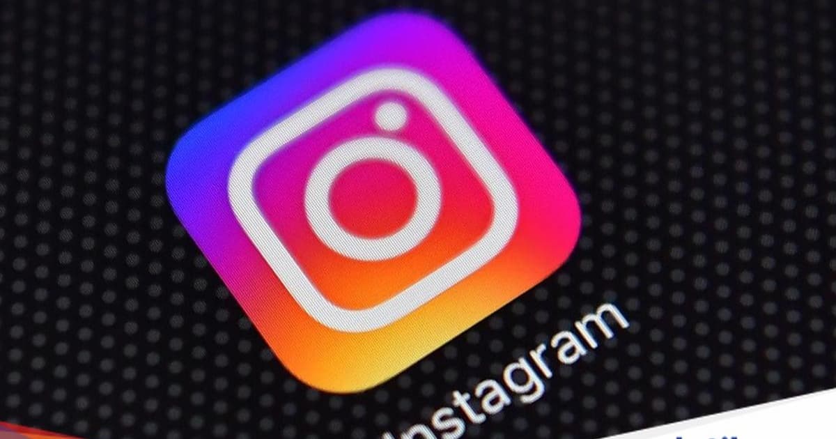 Logo aplikasi Instagram ditampilkan di layar iPhone pada Agustus 2016 di London, Inggris.
