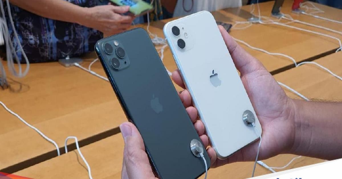 Ilustrasi iPhone 11 di kebun apel yang menunjukkan perangkat lawas rentan terhadap celah keamanan hardware