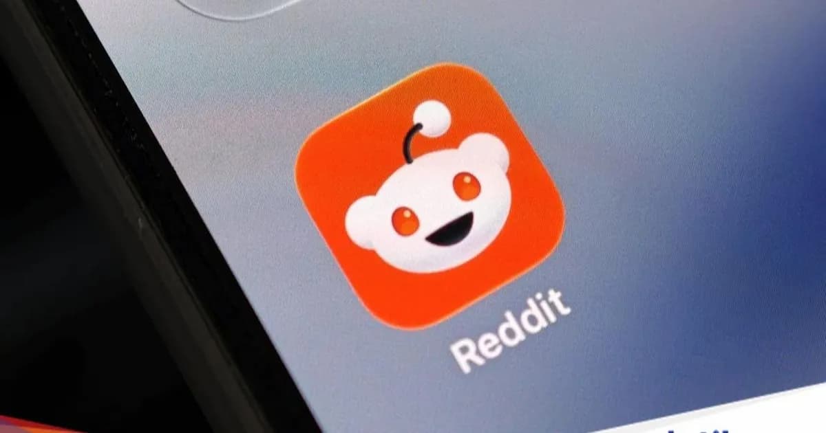 Ilustrasi logo Reddit dengan latar belakang warna merah dan oranye khas platform